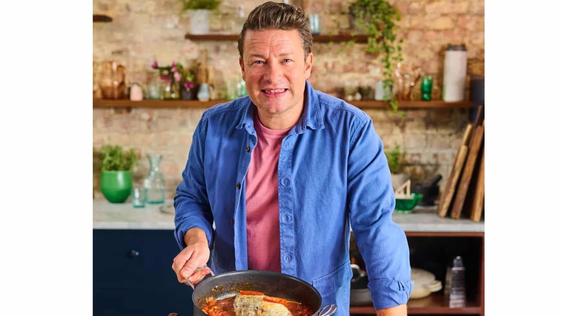 jamie oliver the chef cooking in his kitchen.jpeg