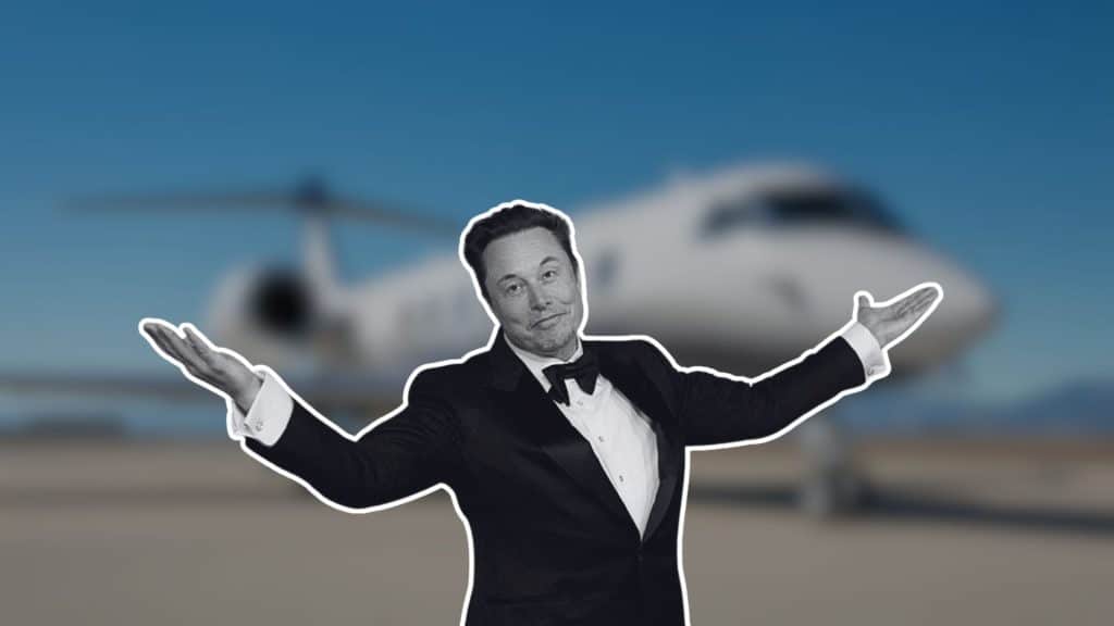 Elon Musk in a tuxedo with his arms spread wide, standing in front of a blurred private jet on the runway.