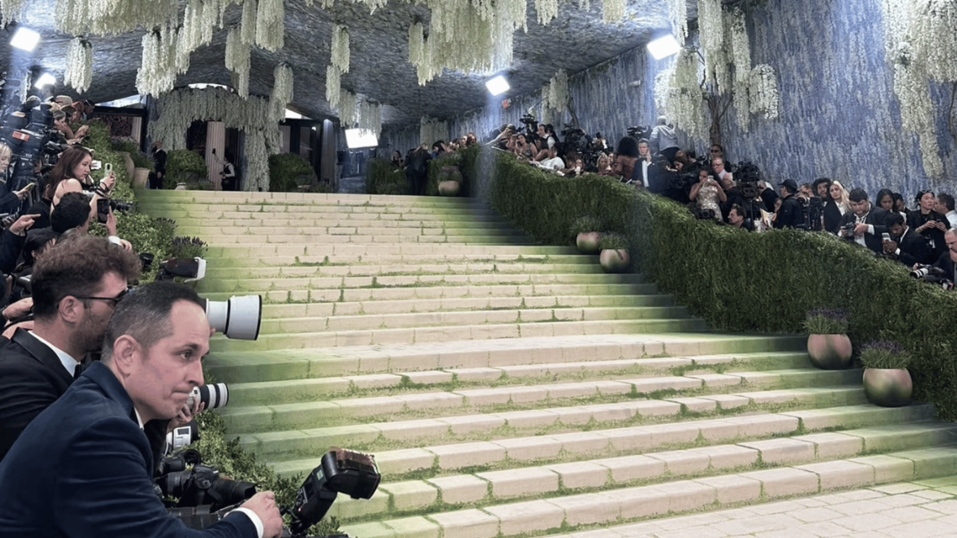 A view of the Met Gala 2026 entrance with photographers lining the steps, capturing arrivals.