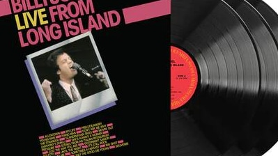 Billy Joel album cover featuring the legendary singer-songwriter at the piano during the peak of his music career.