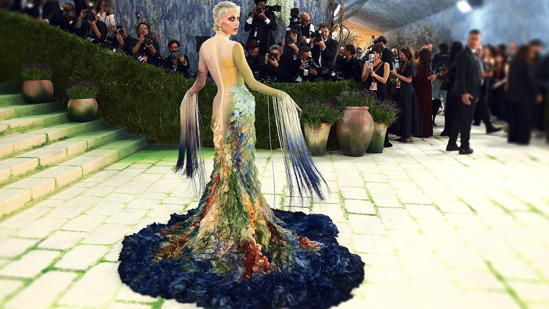 Emma Chamberlain at Met Gala 2026 in a hand-painted Mugler gown inspired by oil and watercolor artwork
