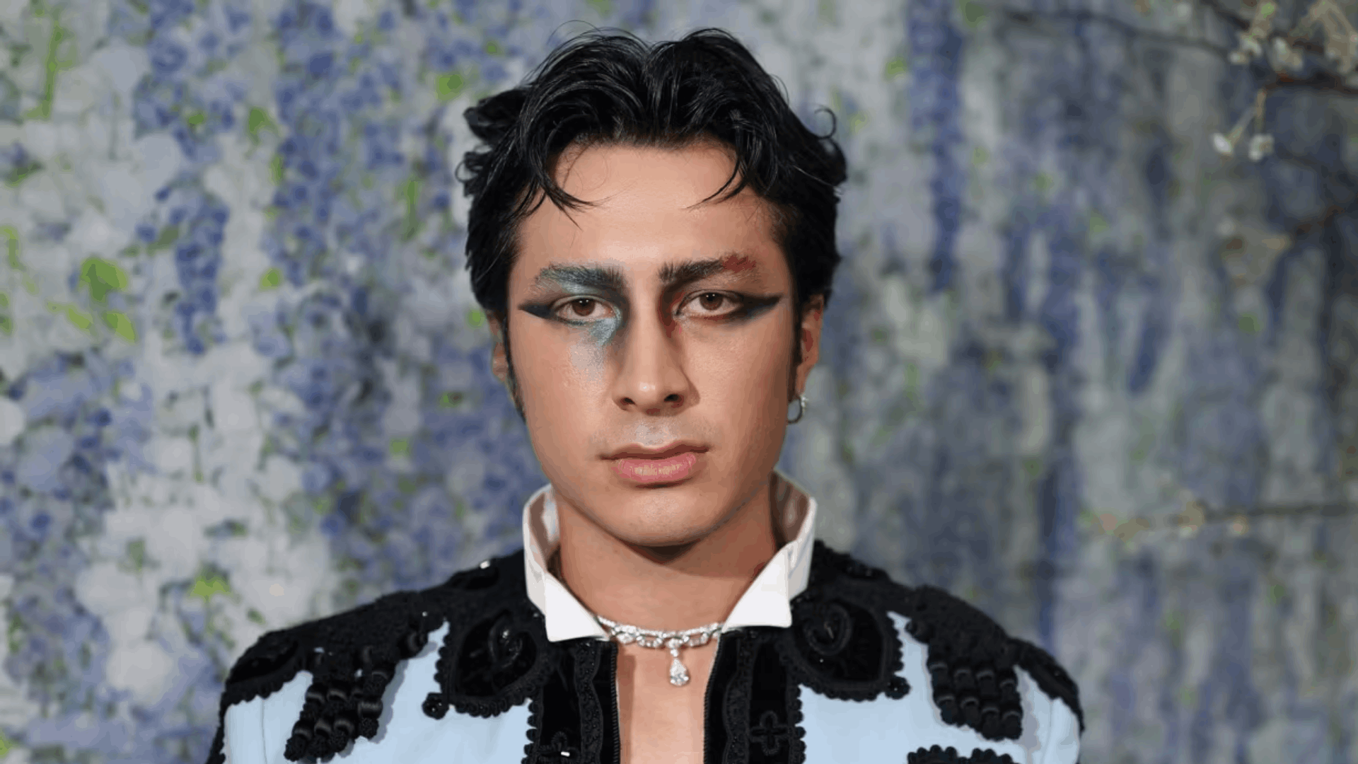 Hudson Williams in a Bulgari look, lacking creativity and engagement with the Met Gala theme.