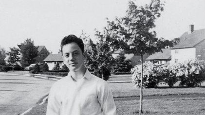 Billy Joel as a child during his early years, portrait-style childhood photo with a vintage look.