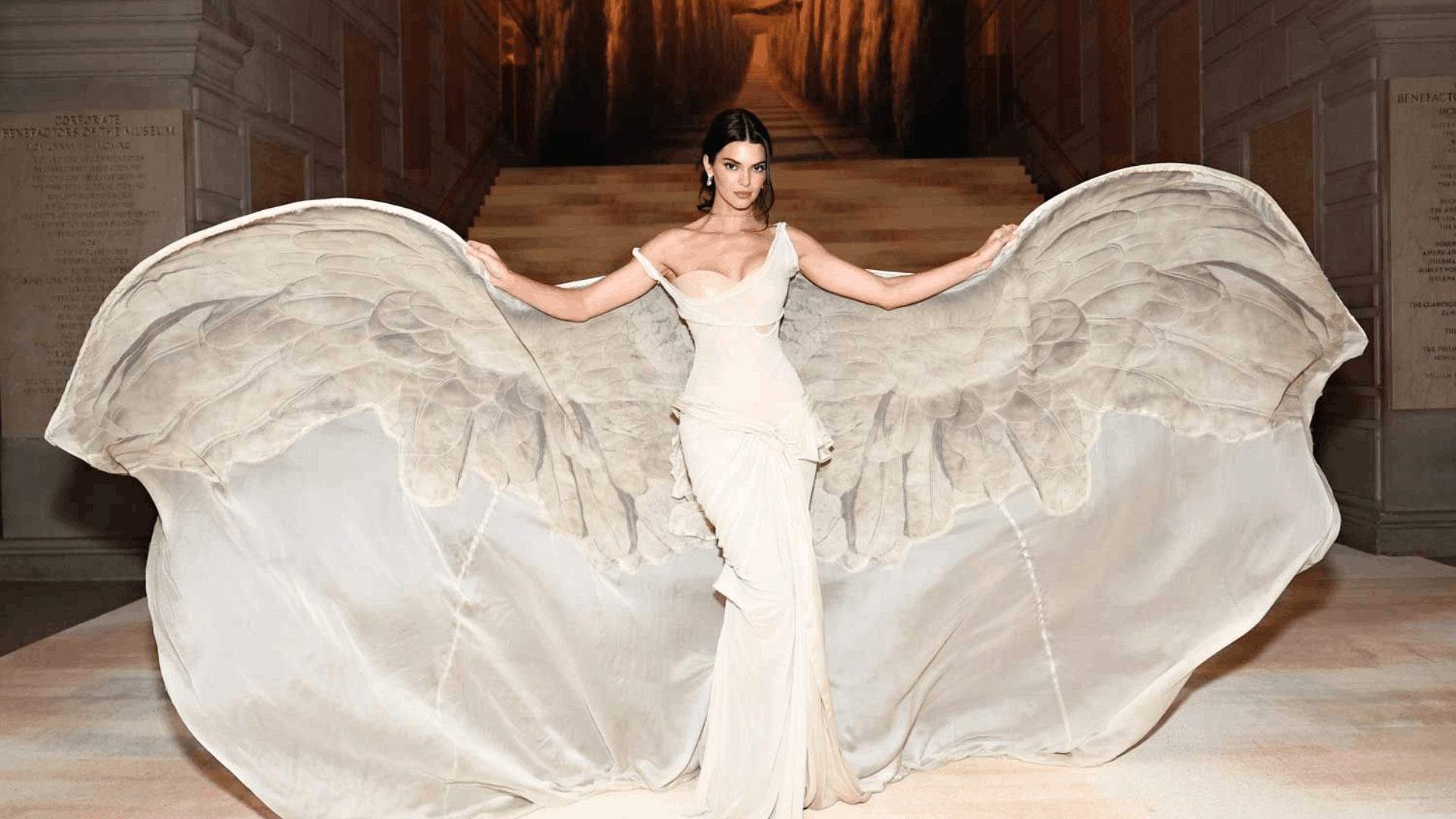 Kendall Jenner in a sculptural custom Gap Studio by Zac Posen, inspired by the Victory of Samothrace.