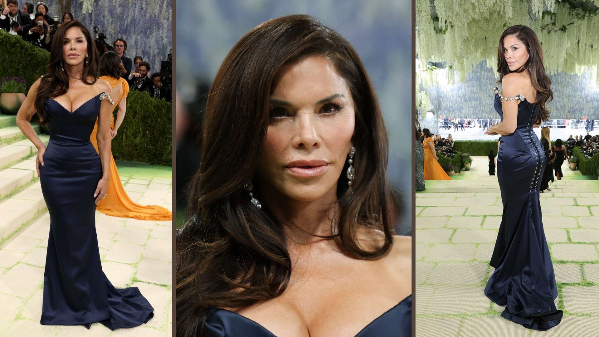 Lauren Sanchez-Bezos in a navy blue dress with an orange drape at the Met Gala.
