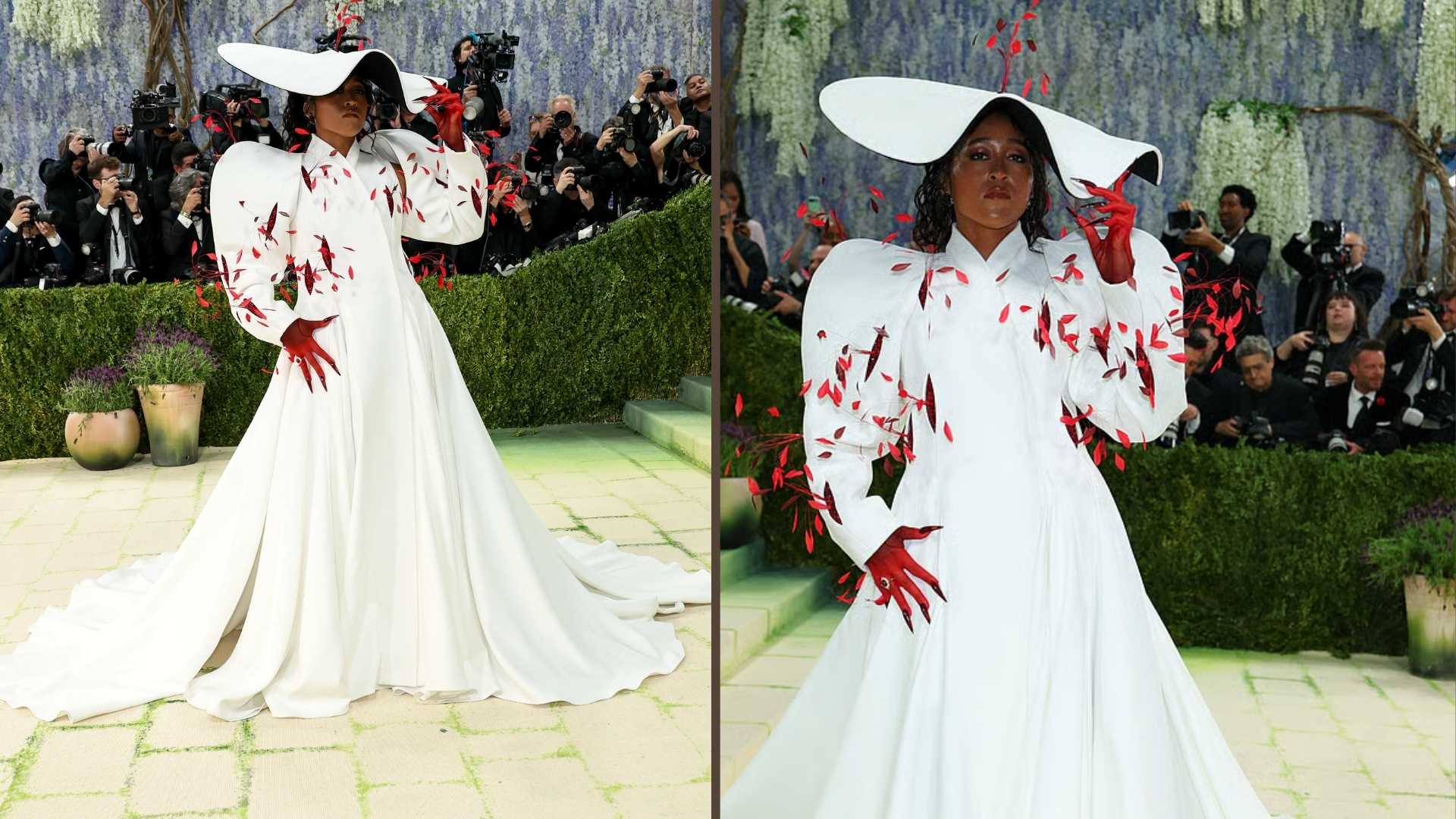 Naomi Osaka in a dramatic white gown with a large bow and butterfly details at the Met Gala.