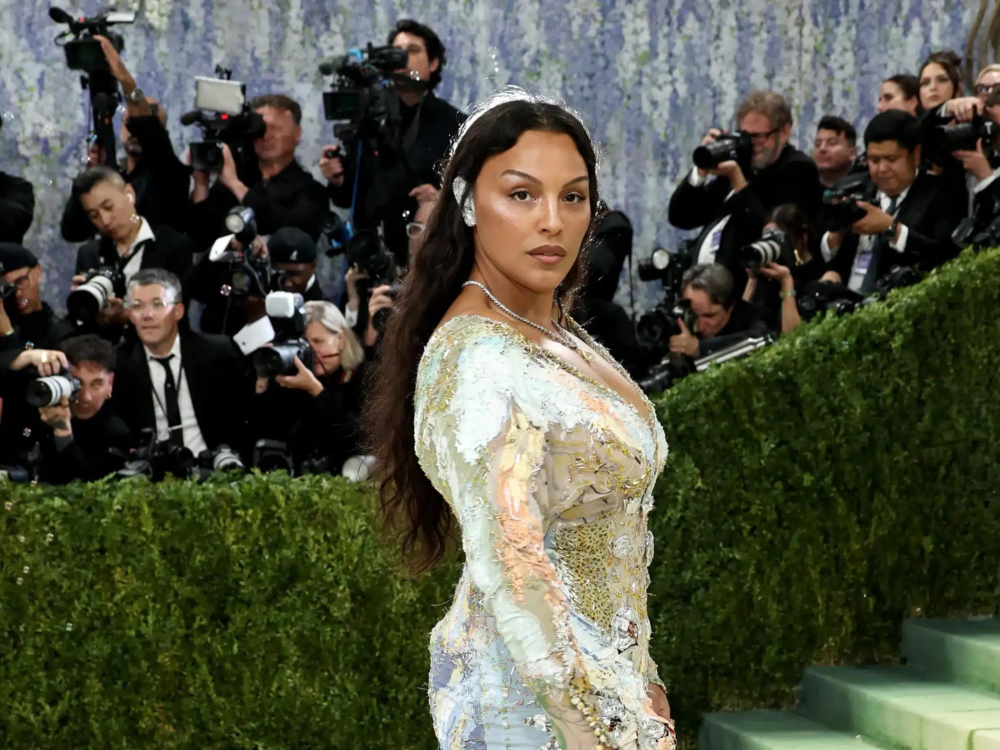 Paloma Elsesser at the Met Gala in a colorful couture dress.