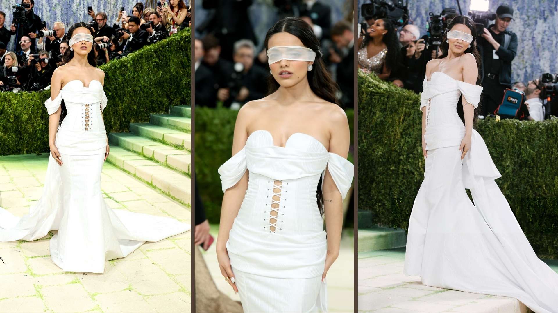 Rachel Zegler at the Met Gala wearing a strapless white dress with lace-up details and a long train.