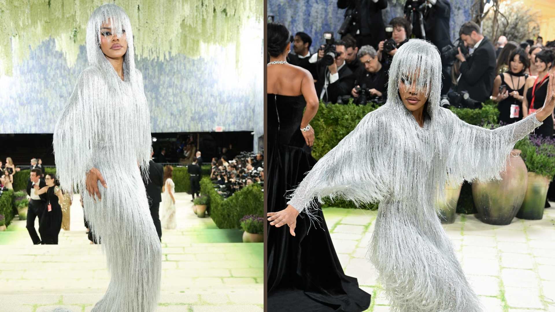 Teyana Taylor wearing a sparkling fringe silver gown at the Met Gala.