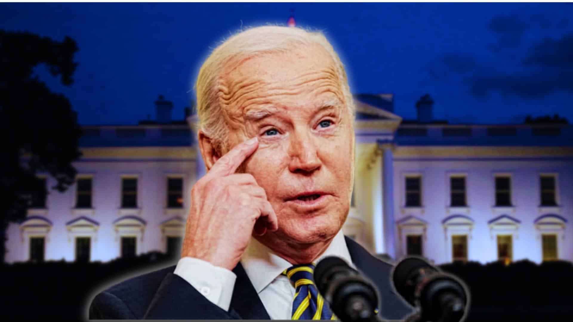 Joe Biden speaking at podium with White House in background, touching face in thoughtful expression.