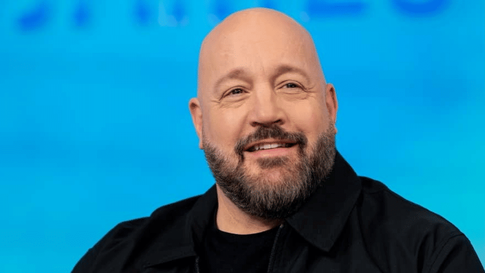 Portrait of a smiling Kevin James. His successful acting career has built an impressive kevin james net worth.