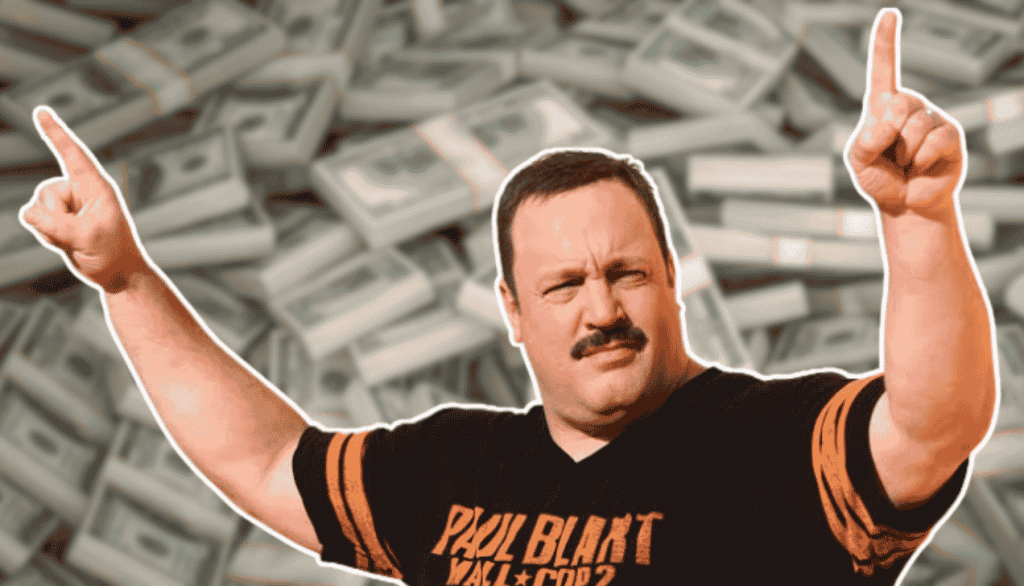 Kevin James pointing up in a Paul Blart t-shirt against a background of money stacks, representing Kevin James net worth.