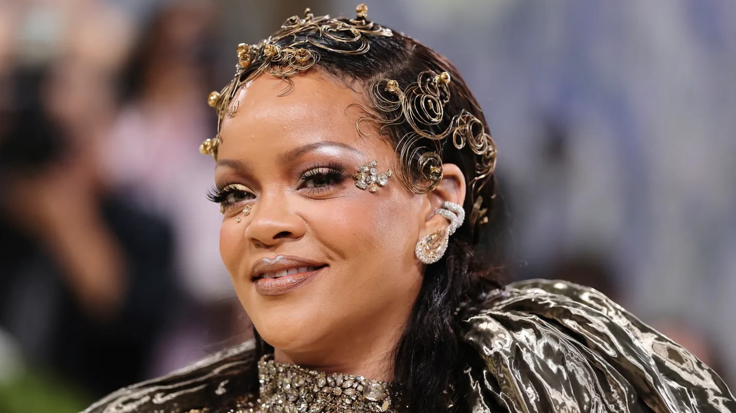 Rihanna accessorizes her Met Gala 2026 look with exquisite, statement-making jewelry, featuring intricate designs.