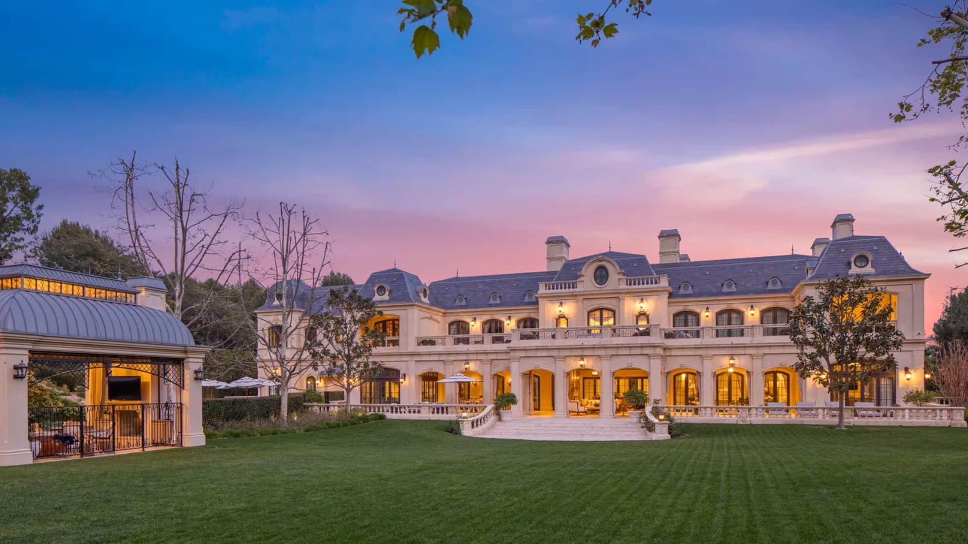 A sprawling French chateau-style estate in Beverly Park, California, featuring a grand main house with multiple wings