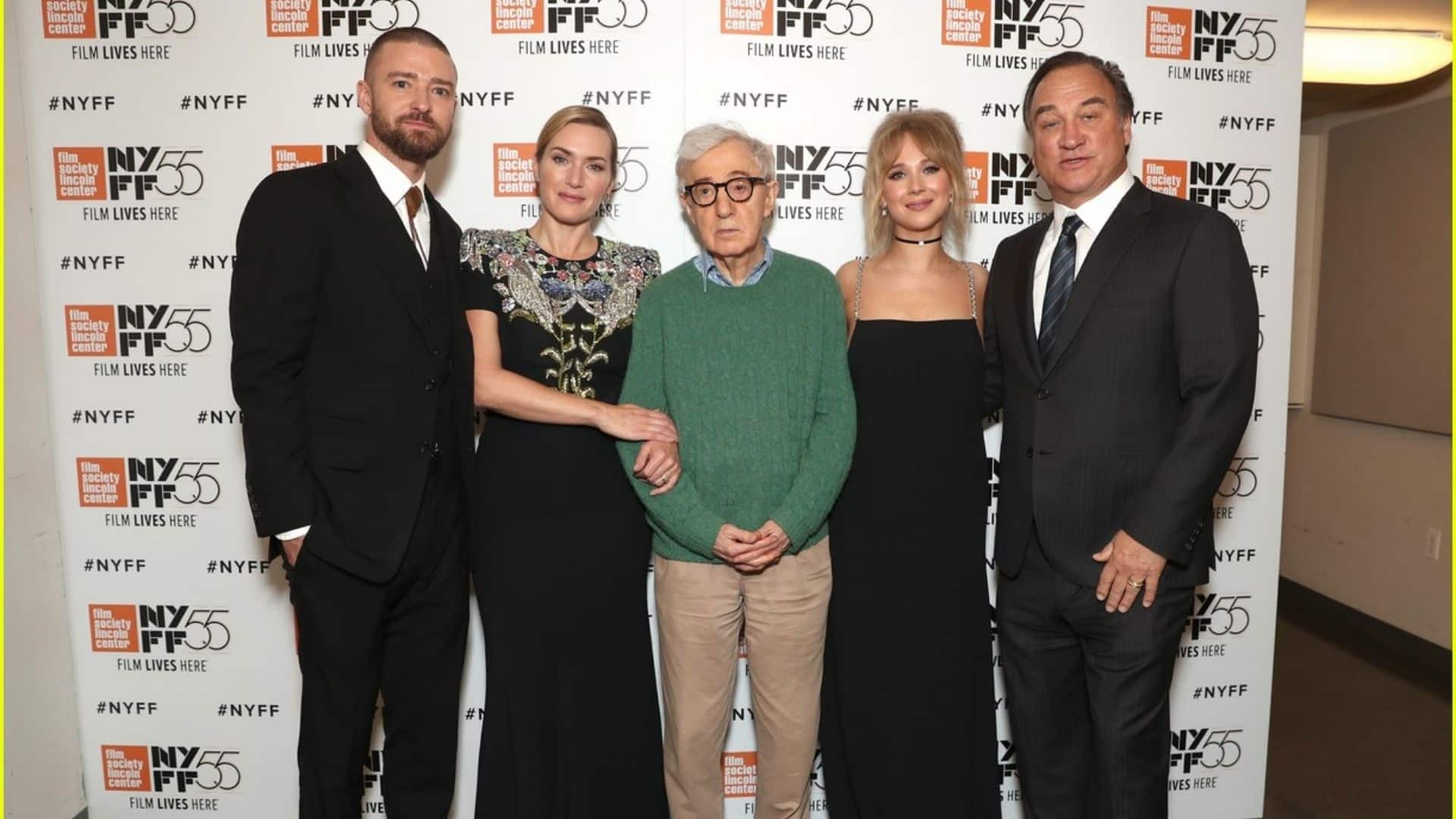 Cast of Wonder Wheel posing together on red carpet in front of a film festival backdrop