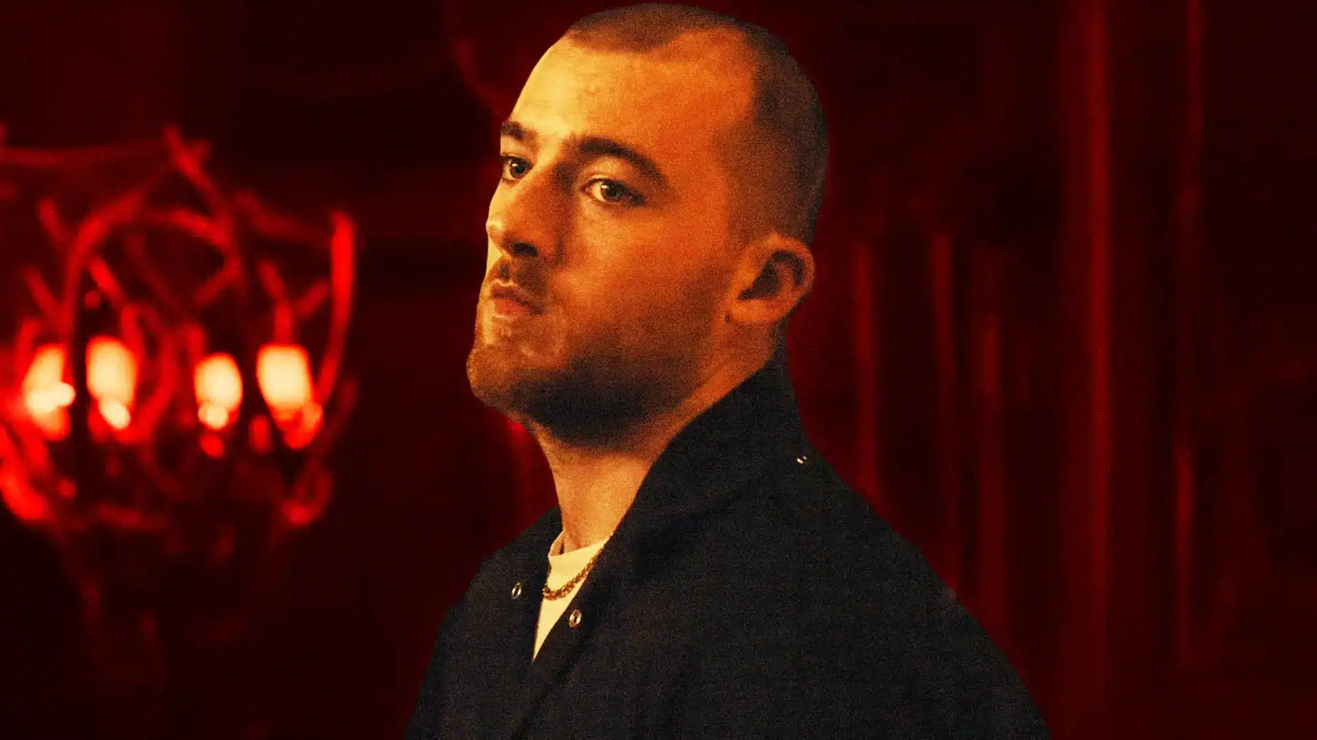 Angus Cloud in a movie role, wearing casual clothing on set, with a focused expression, highlighting his natural presence and acting style.
